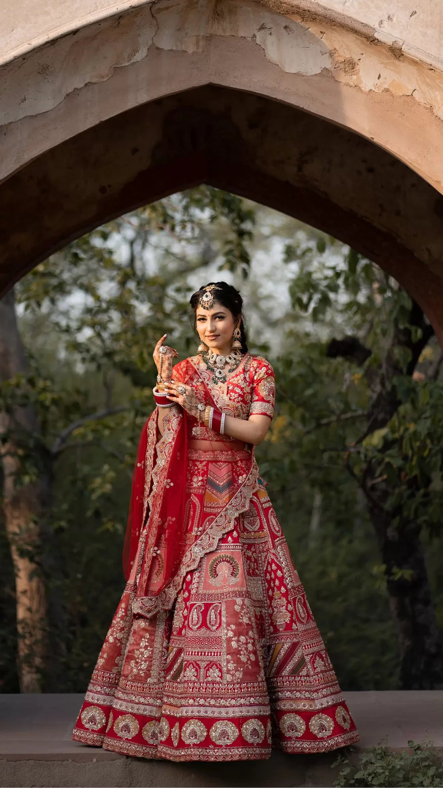 Traditional tomato red lehenga in Jodhpuri style