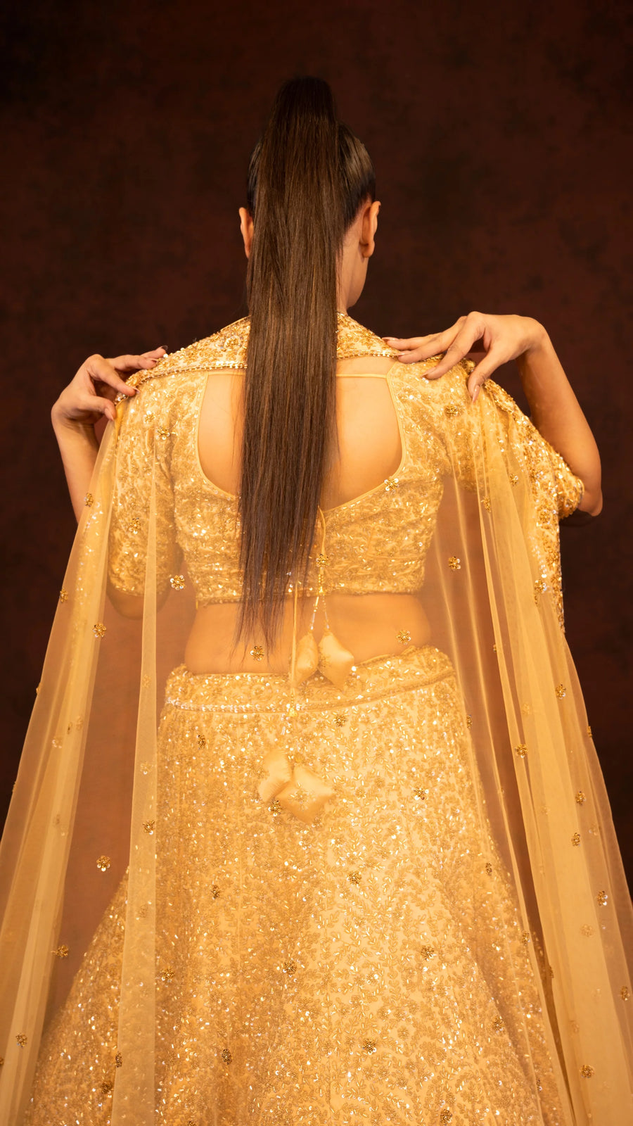 Golden heavy traditional lehenga in kaftan silk