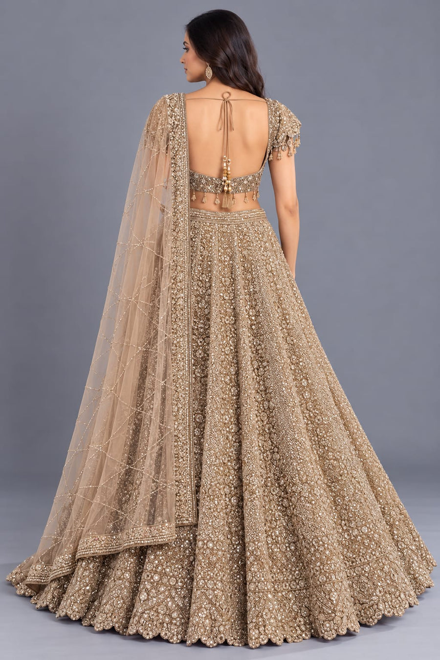 Champagne Gold Heavy Embroidered Lehenga with Net Dupatta