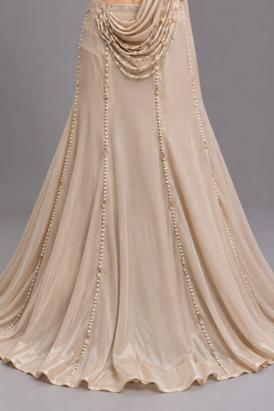 Champagne Beige Pearl Embellished Designer Drape Saree with Halter Neck Blouse