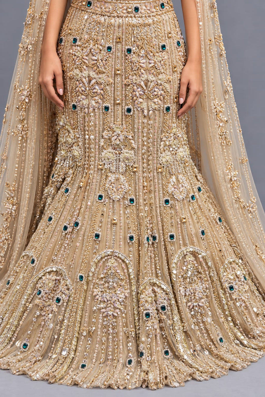 Gold Fishcut Lehenga with Intricate Embroidery and Cape Sleeves
