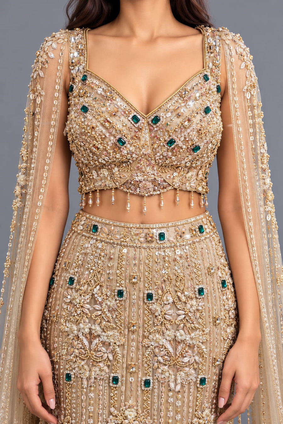 Gold Fishcut Lehenga with Intricate Embroidery and Cape Sleeves