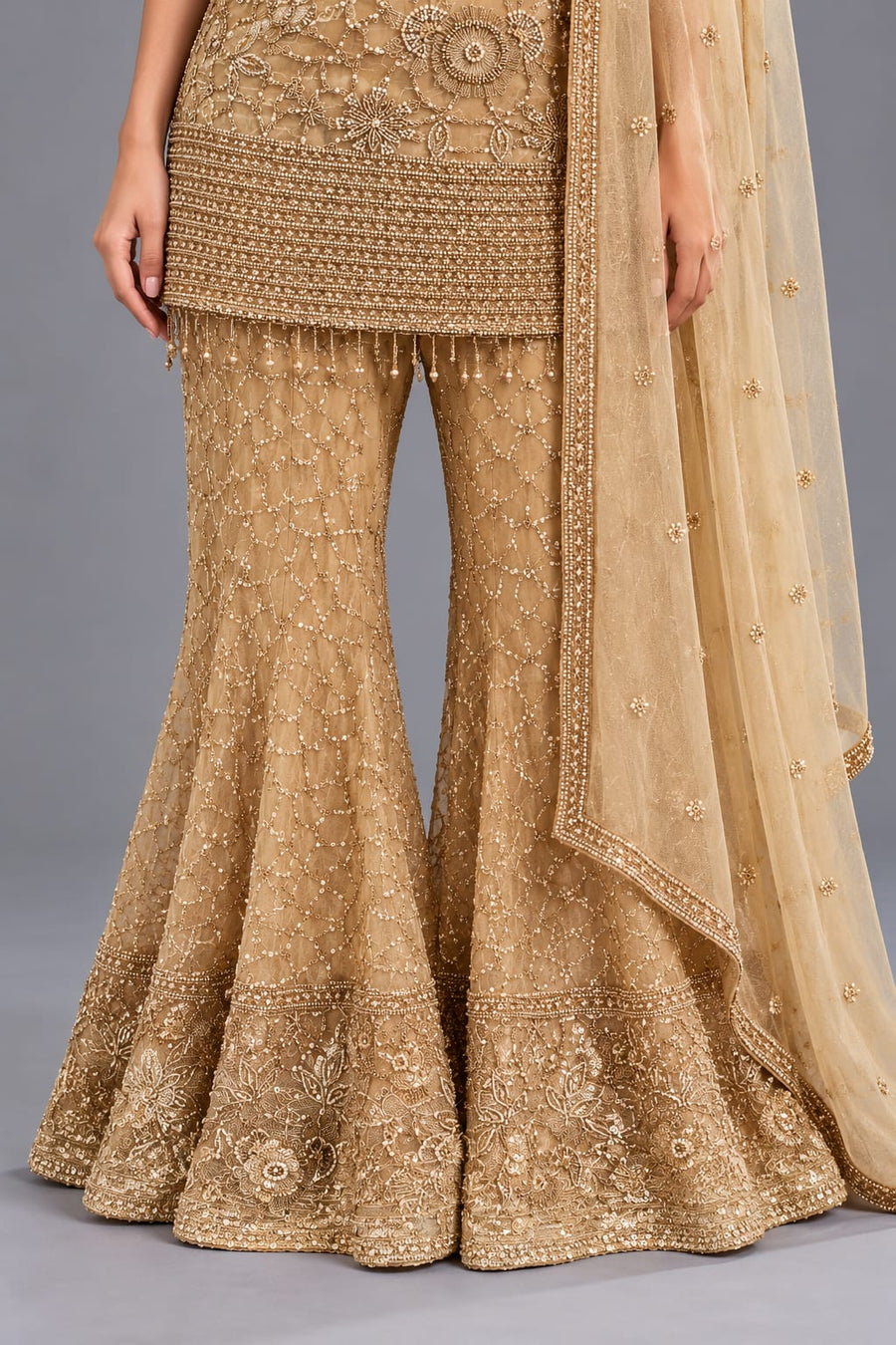 Golden Embroidered Peplum Sharara Set with Net Dupatta