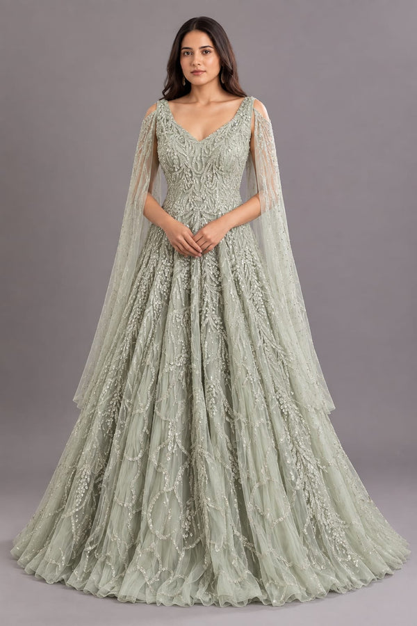 Pista Green Embroidered Flared Gown with V-Neck and Cape Sleeves