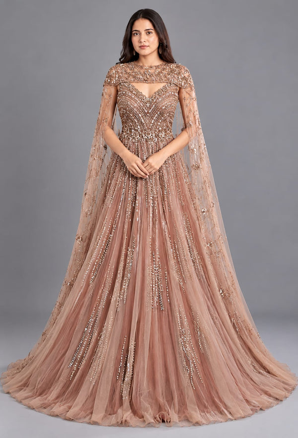 Rose Gold Designer Net Gown with Sequin Work and Cape Sleeves