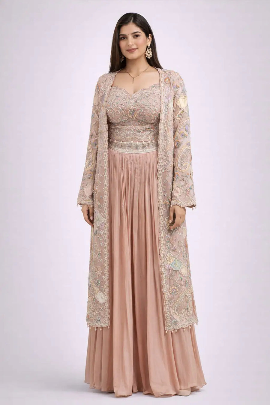 long embroidered jacket and pink skirt