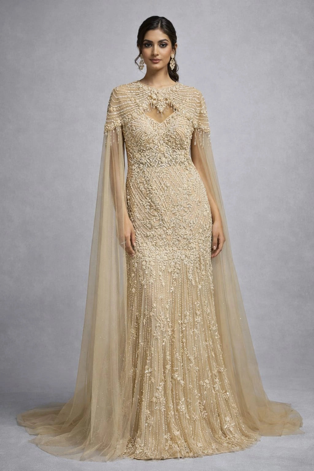  beige embroidered gown with cape