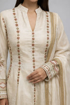 cream traditional suit