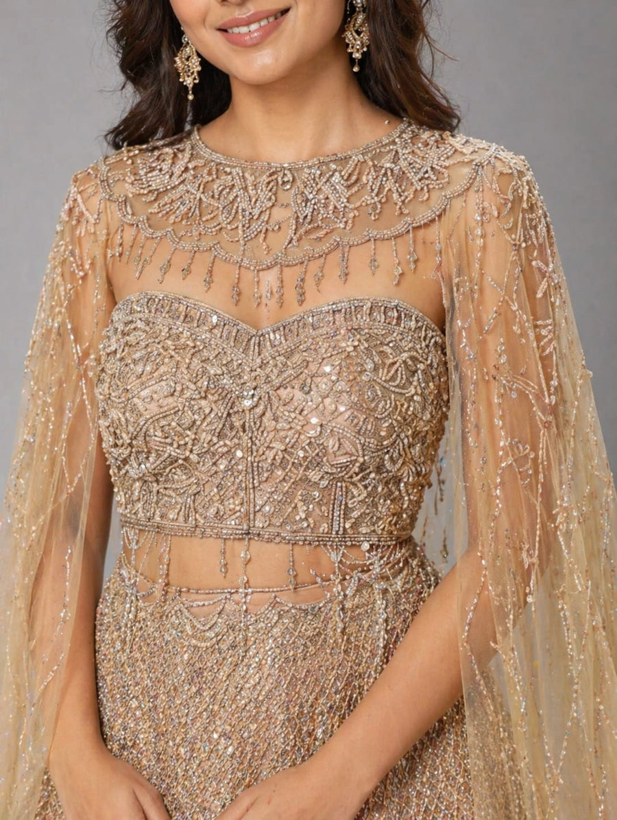 gold cape lehenga