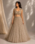 gold embellished cape gown