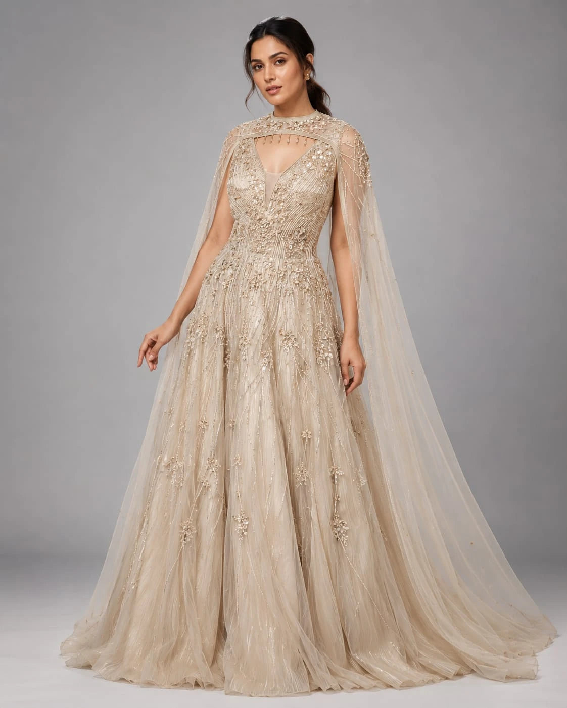 gold cape sleeve gown