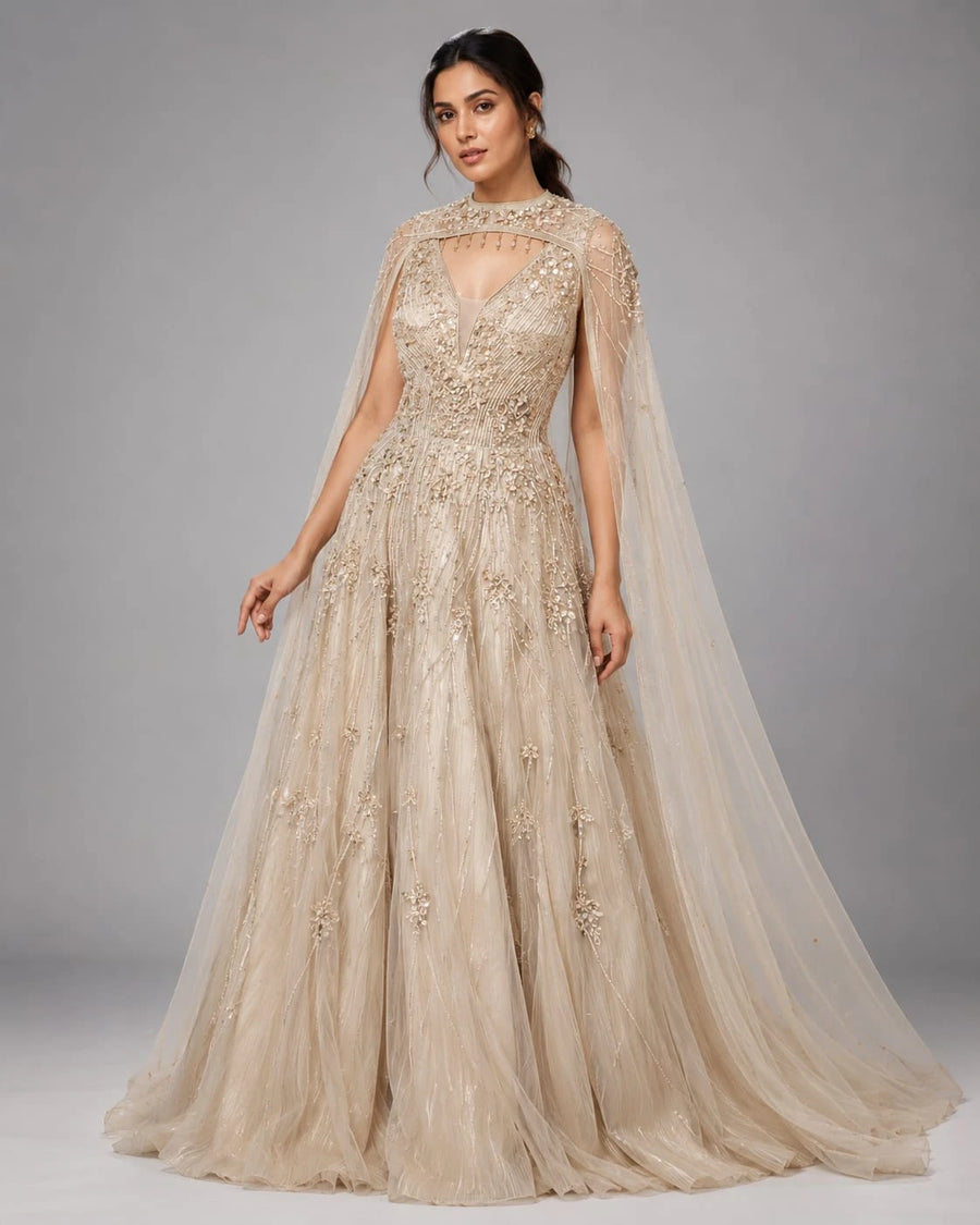 gold cape sleeve gown