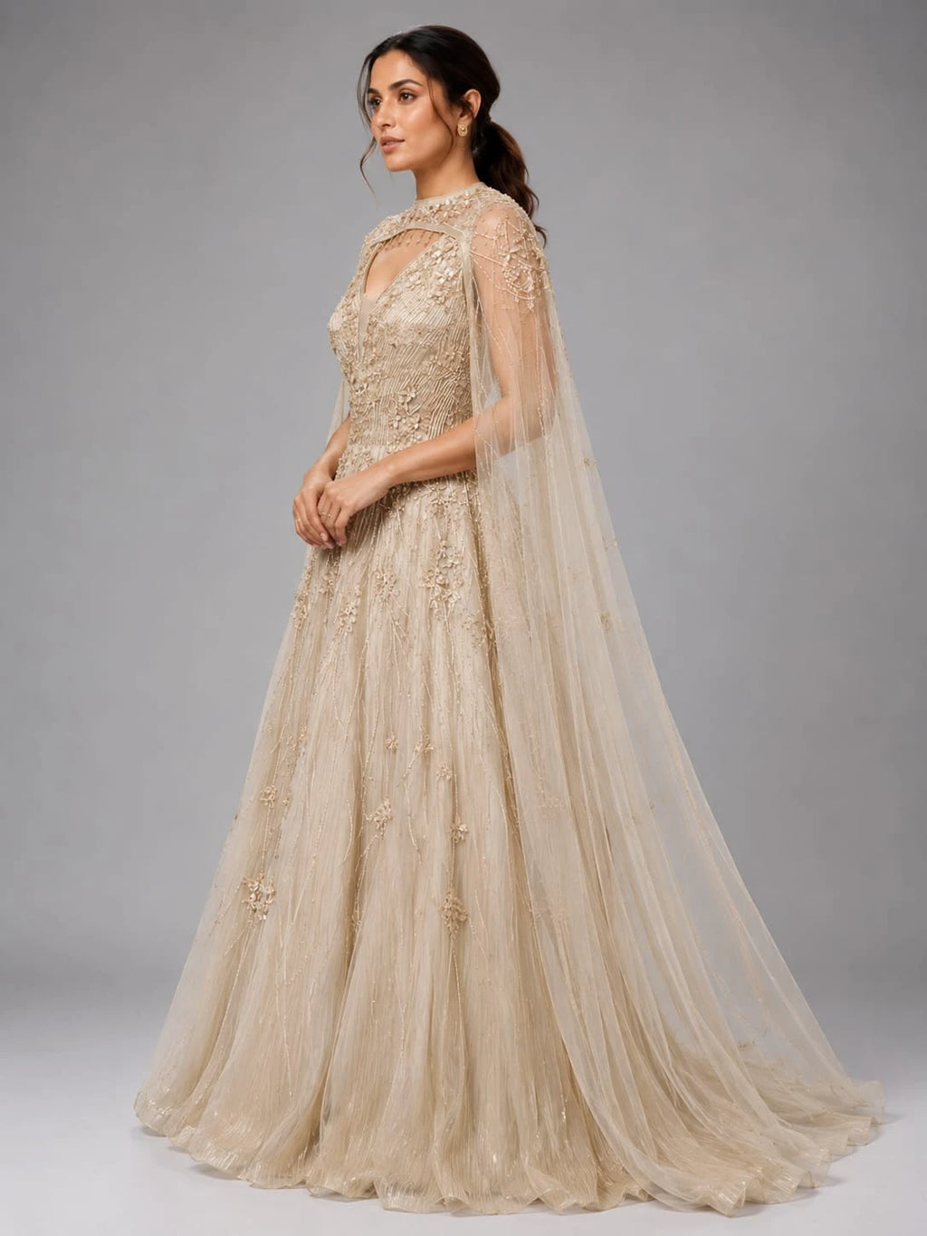 gold cape sleeve gown