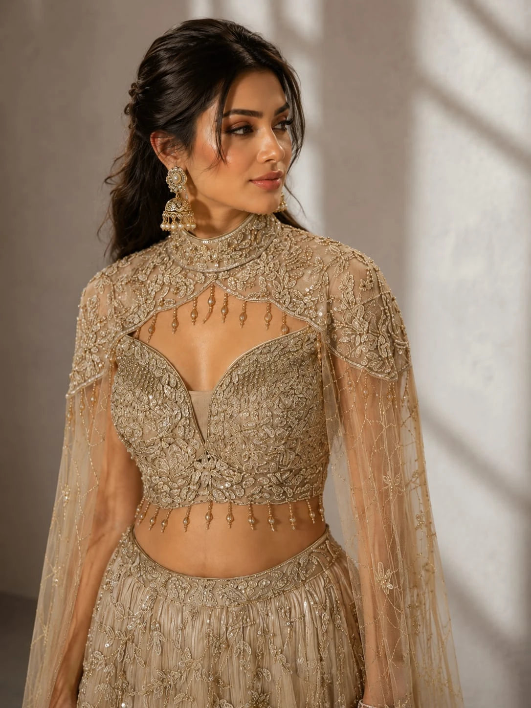 golden cape style lehenga