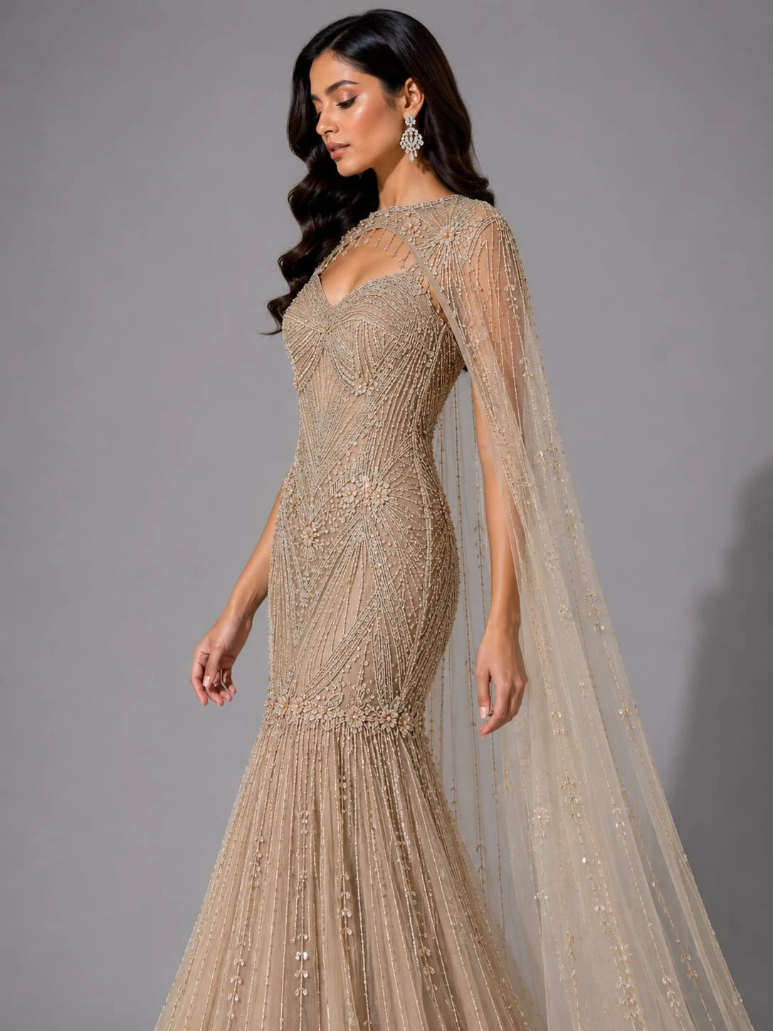 golden cape sleeve gown