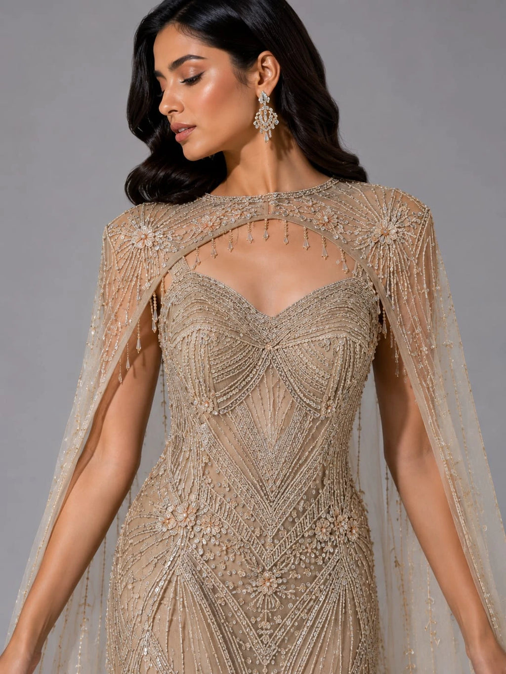 golden cape sleeve gown