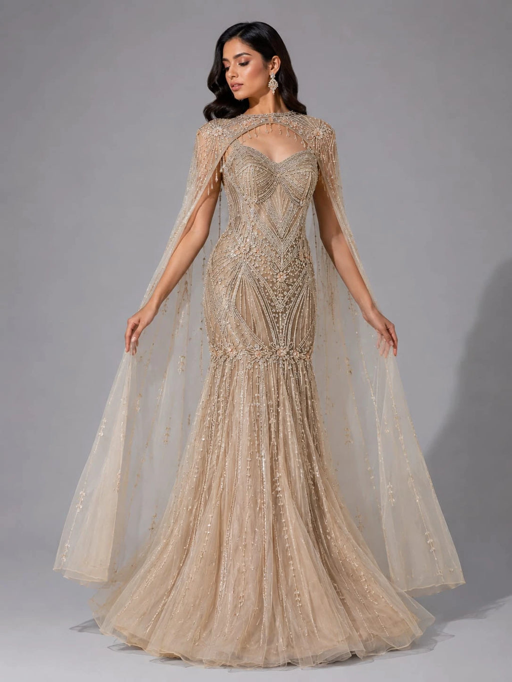 golden cape sleeve gown