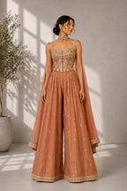 rust wedding guest outfit