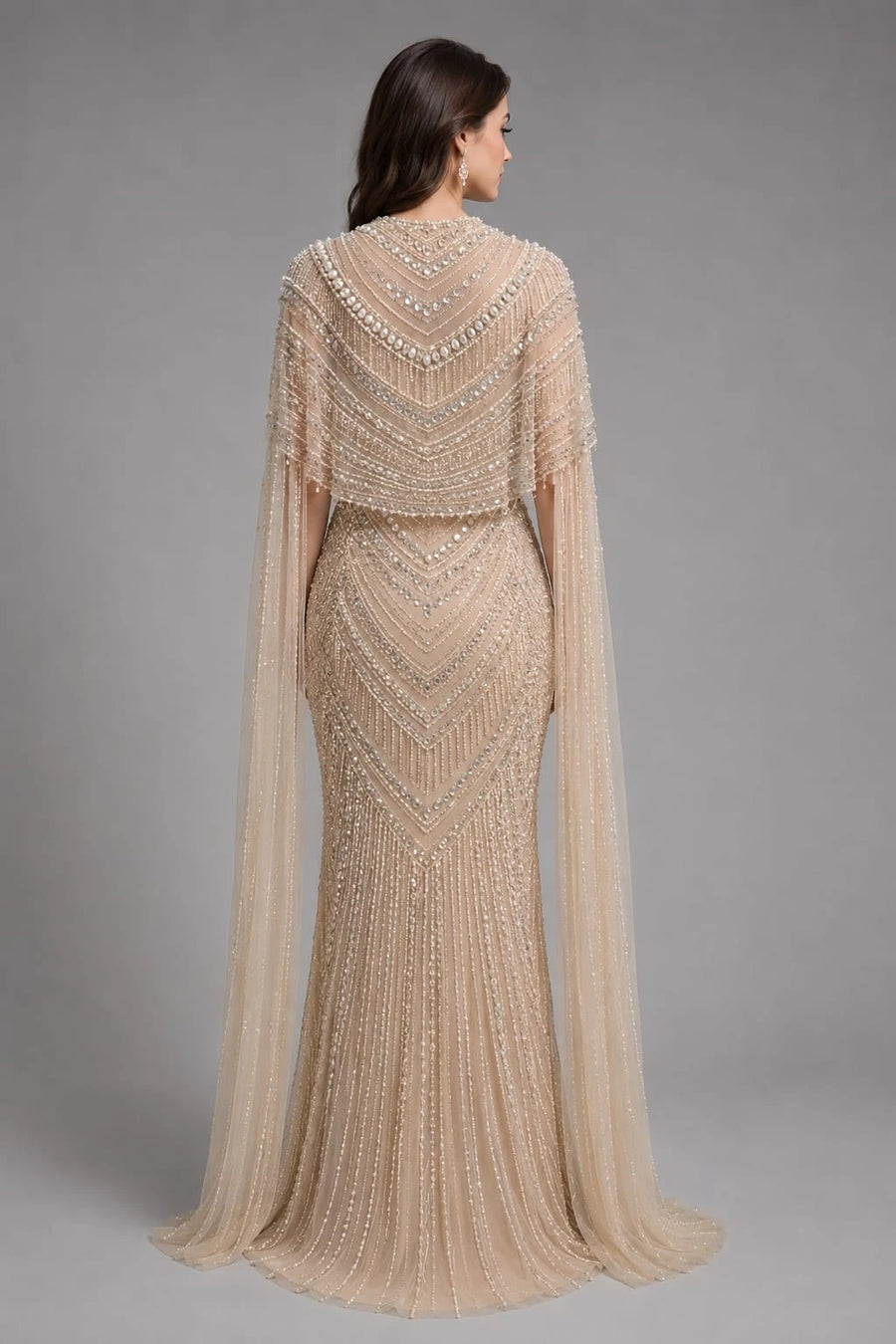 cream cape gown