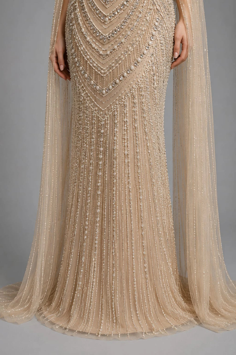 cream cape gown